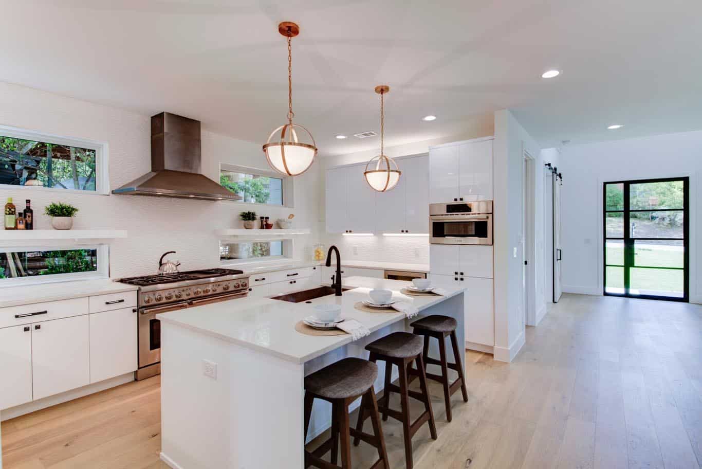 Picture of a kitchen with bar stools