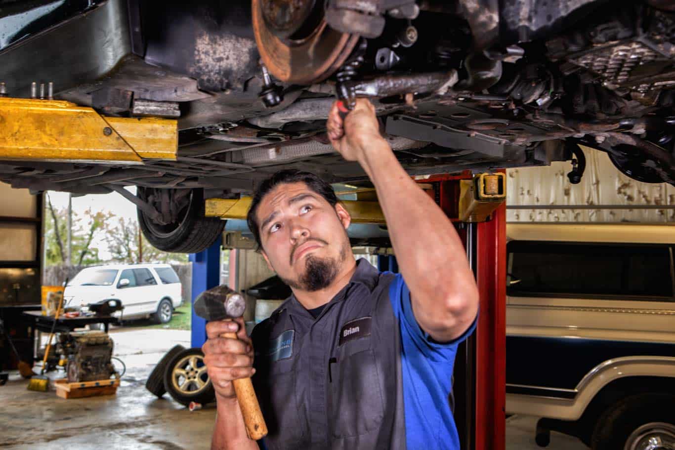 Personal Branding Man working on a car